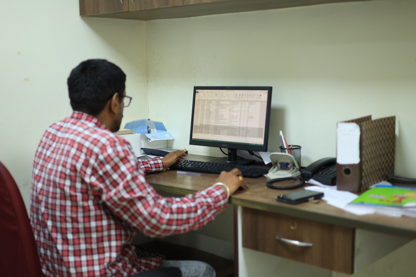 Lab technicians at the microscope