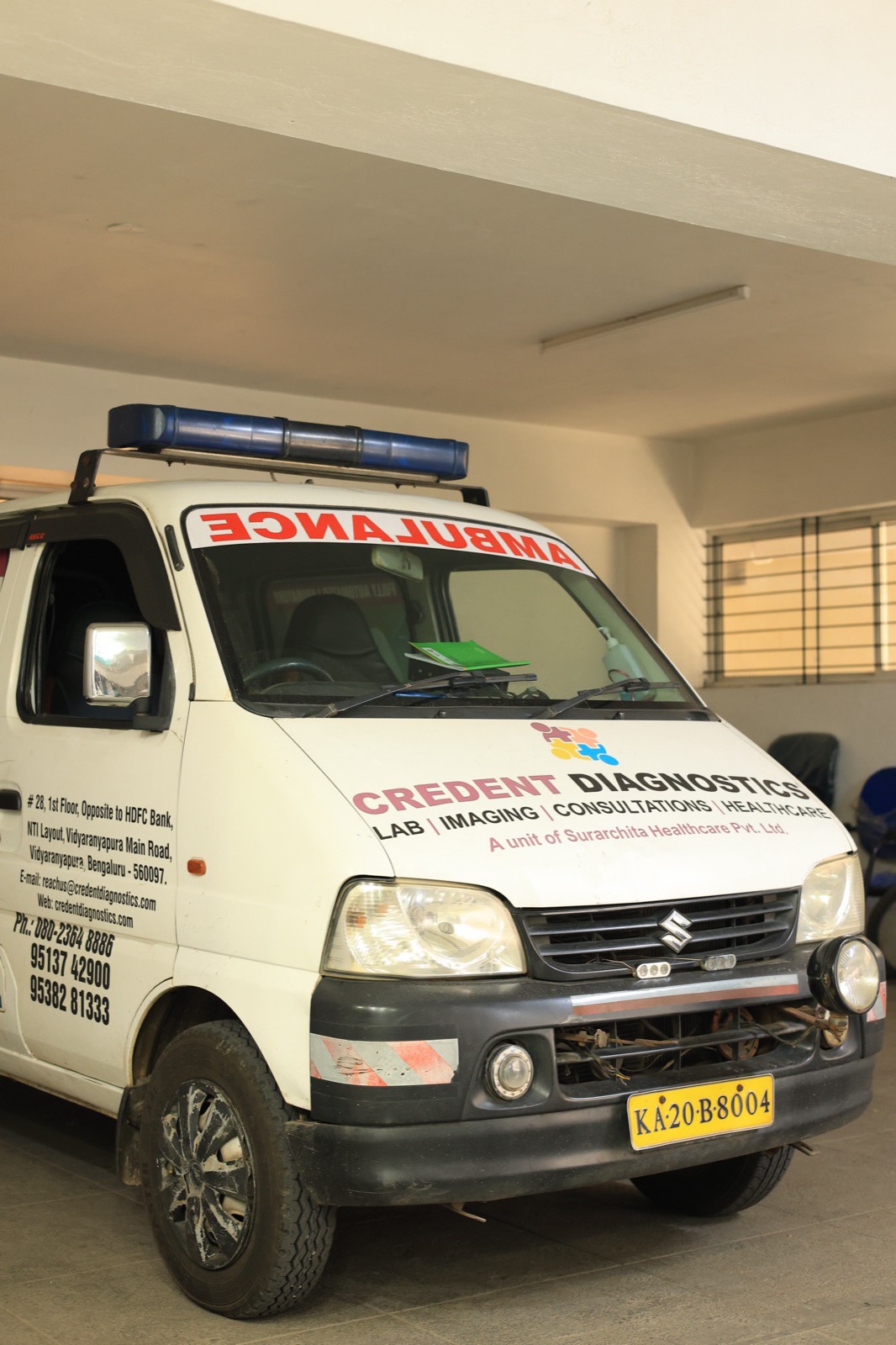 Branded ambulance — side view